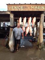 Capt Gray with a 183 pound yellowfin tuna